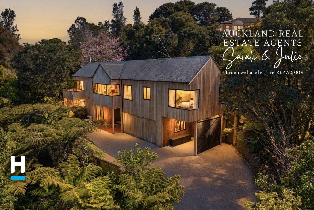 Cedar-clad Hillsborough home with decks and native bush overlooking Manukau Harbour views